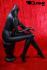 Weibliche Schaufensterpuppe Schaufensterfigur schwarz sitzend kopflos Mannequin